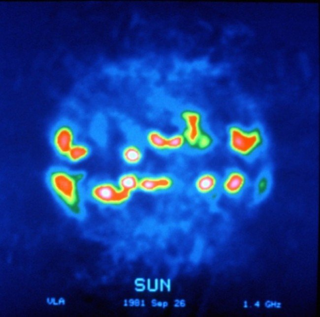 The radio Sun: radio image of the Sun recorded by VLA. The brightest regions are part of corona nearby but beyond sunspots. Courtesy (NRAO/AUI)